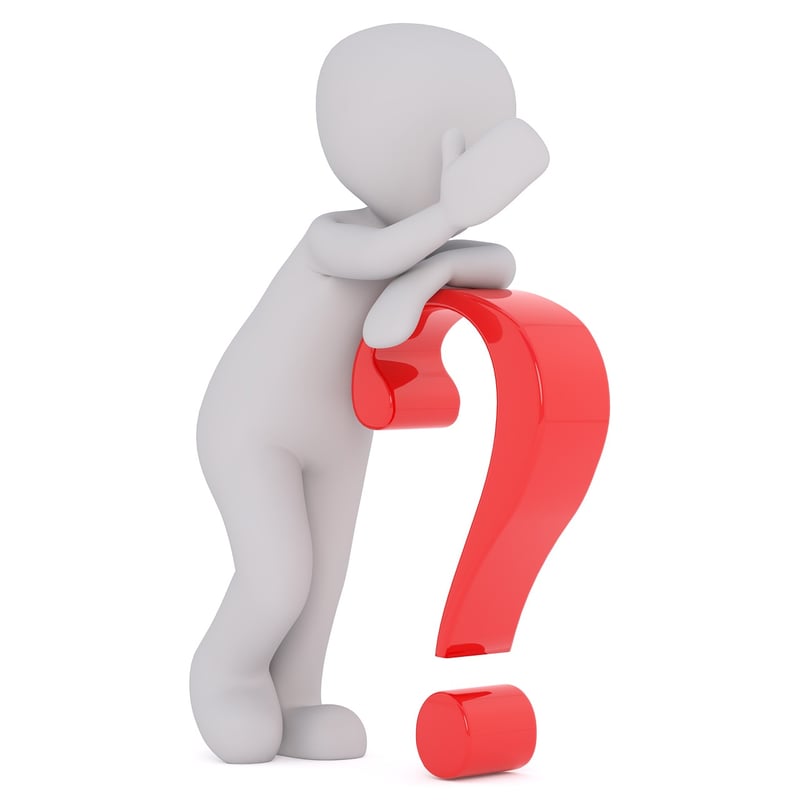 Pile of question marks symbolizing rumors